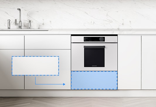 주방의 싱크대 하부장 안에 Bespoke 콤팩트 오븐을 설치한 모습입니다.