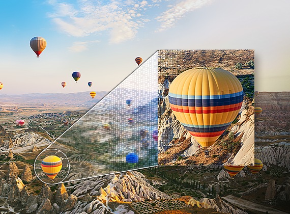 열기구가 하늘을 날고 있는 풍경 사진이 있습니다. 사진의 일부를 잘라내고 실제와 같은 색감과 디테일을 나타내고 있습니다.