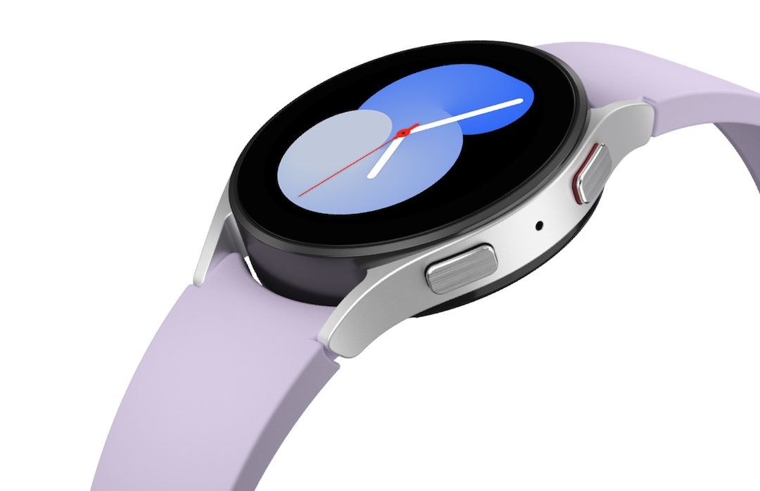 A Silver Galaxy Watch5 is displayed with a band. The watch face shows one of the designs that display the time as '5' in a gradient blue colour.