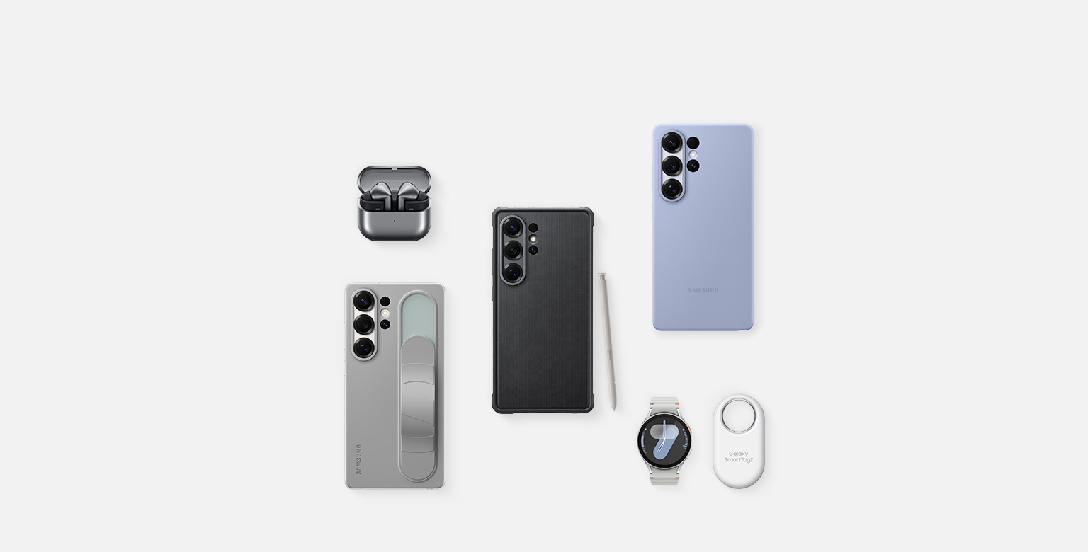 A flat lay of Samsung accessories for Galaxy S25 Ultra: First, Galaxy Buds3 Pro in Silver with the ear buds, Galaxy S25 Ultra with Rugged Case installed and S Pen in Light Gray, Galaxy S25 Ultra with Silicone Case in Light Blue installed, Galaxy Watch Ultra in Titanium Silver, Galaxy S25 Ultra with Standing Grip Case in Gray installed.