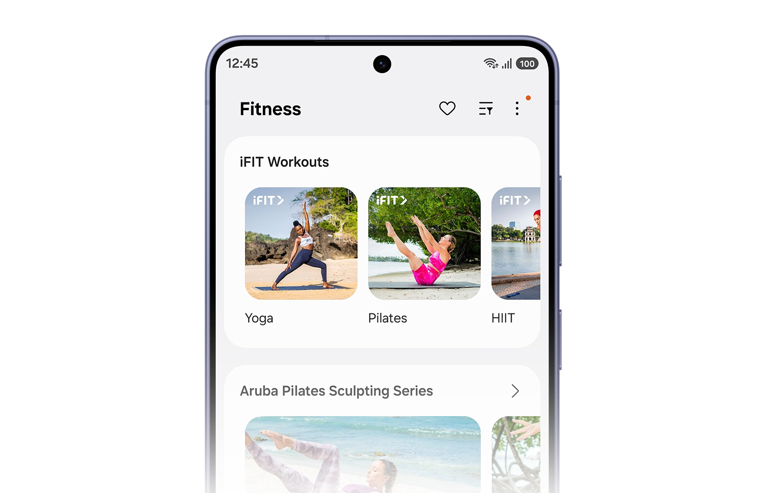 On the screen of Galaxy S26, iFIT is open showing different workout options including Yoga, Pilates and HIIT.