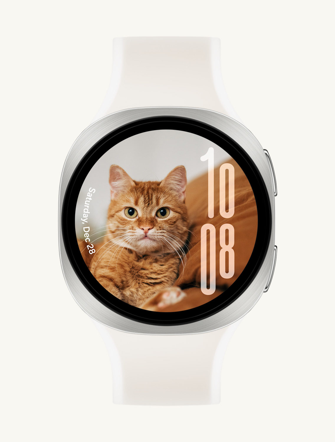 Front view and close-up angled view of Galaxy Watch9 with a Misty Band in Cream, displaying a custom Portrait Watch Face with the date on the left and time on the right, without overlapping with the cat's face.