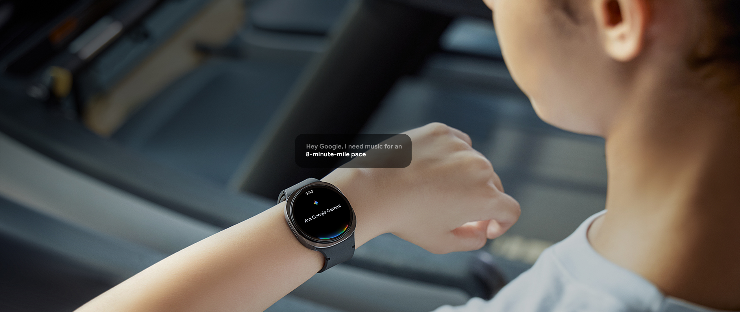 A woman wearing Galaxy Watch8 raises her arm and looks at it. On the screen is the text 'Ask Google Gemini' with a Gemini icon. A pop-up message nearby reads, 'Hey Google, I need music for an 8-minute-mile pace.'