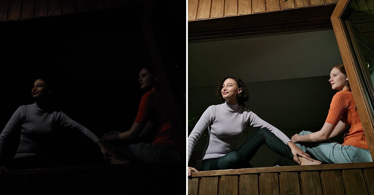 Two women sitting in an open window looking outside. One shot with Galaxy S20 FE without Night mode, and the other shot with Night mode. The image shot with Night mode is clear, detailed, and featuring more color than the other photo.