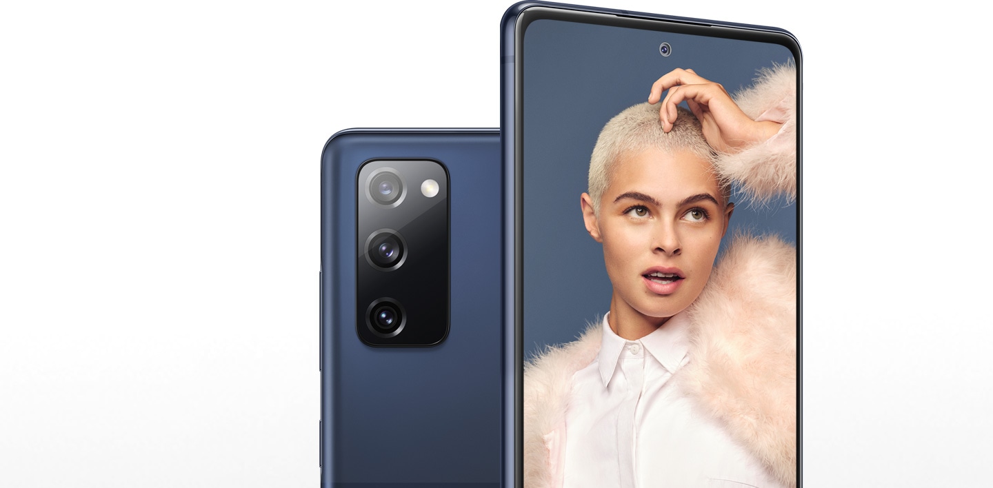 Two Galaxy S20 FE phones in Cloud Navy, one seen from the rear and one seen from the front. The phone seen from the rear shows the locations of the 12MP Ultra Wide Camera, 12MP Wide-angle Camera, and 8MP Telephoto Camera. The phone seen from the front has a portrait of a woman onscreen, and shows the location of the 32MP Front Camera.
