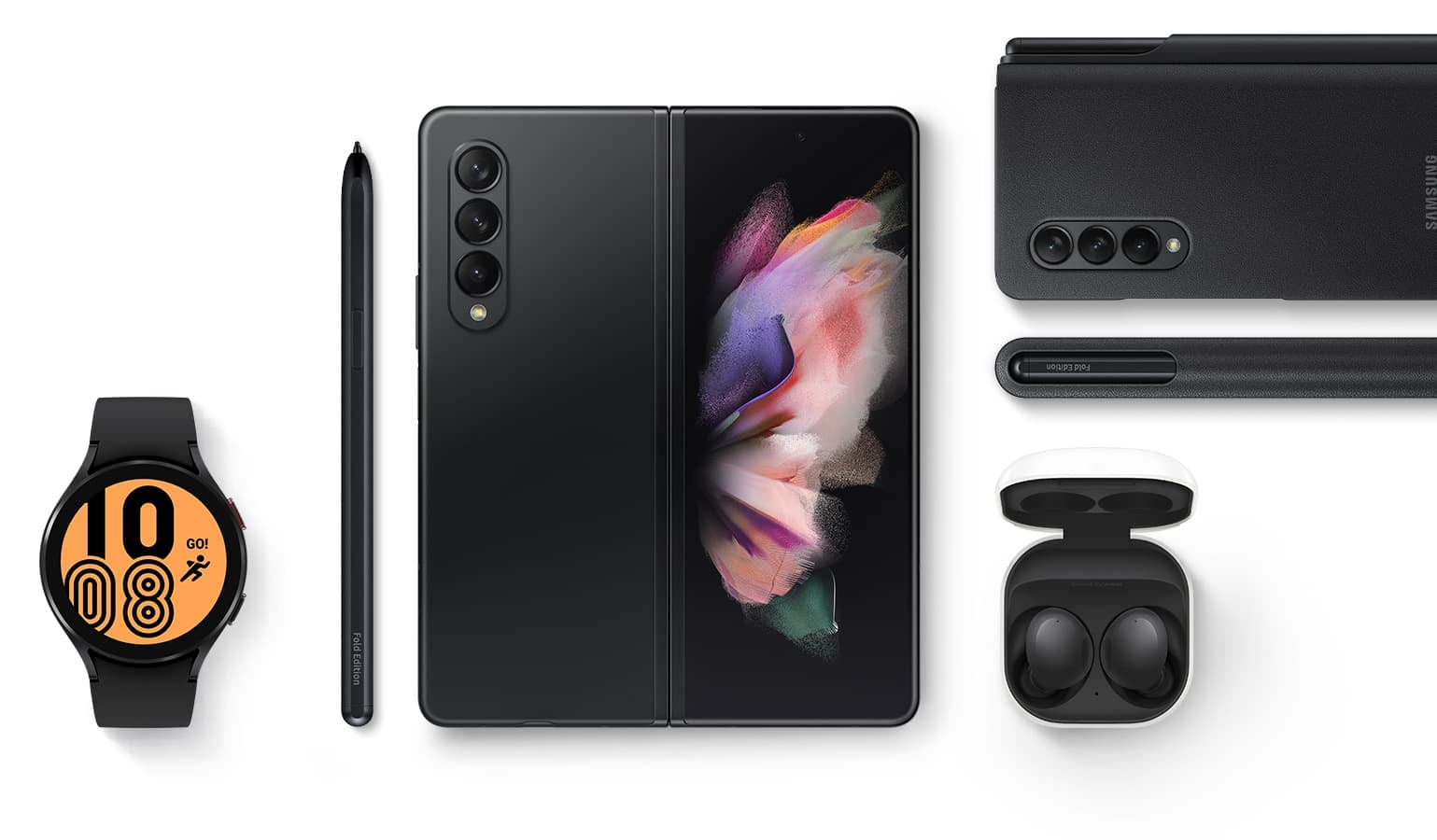 Galaxy Buds2 in Graphite. The cradle is open and the earbuds are inside. S Pen Fold Edition next to unfolded Galaxy Z Fold3 5G seen from the rear with a colorful wallpaper onscreen. Flip Cover with Pen in Black installed on folded Galaxy Z Fold3 5G seen from the rear. S Pen Fold Edition seen in the sleeve.