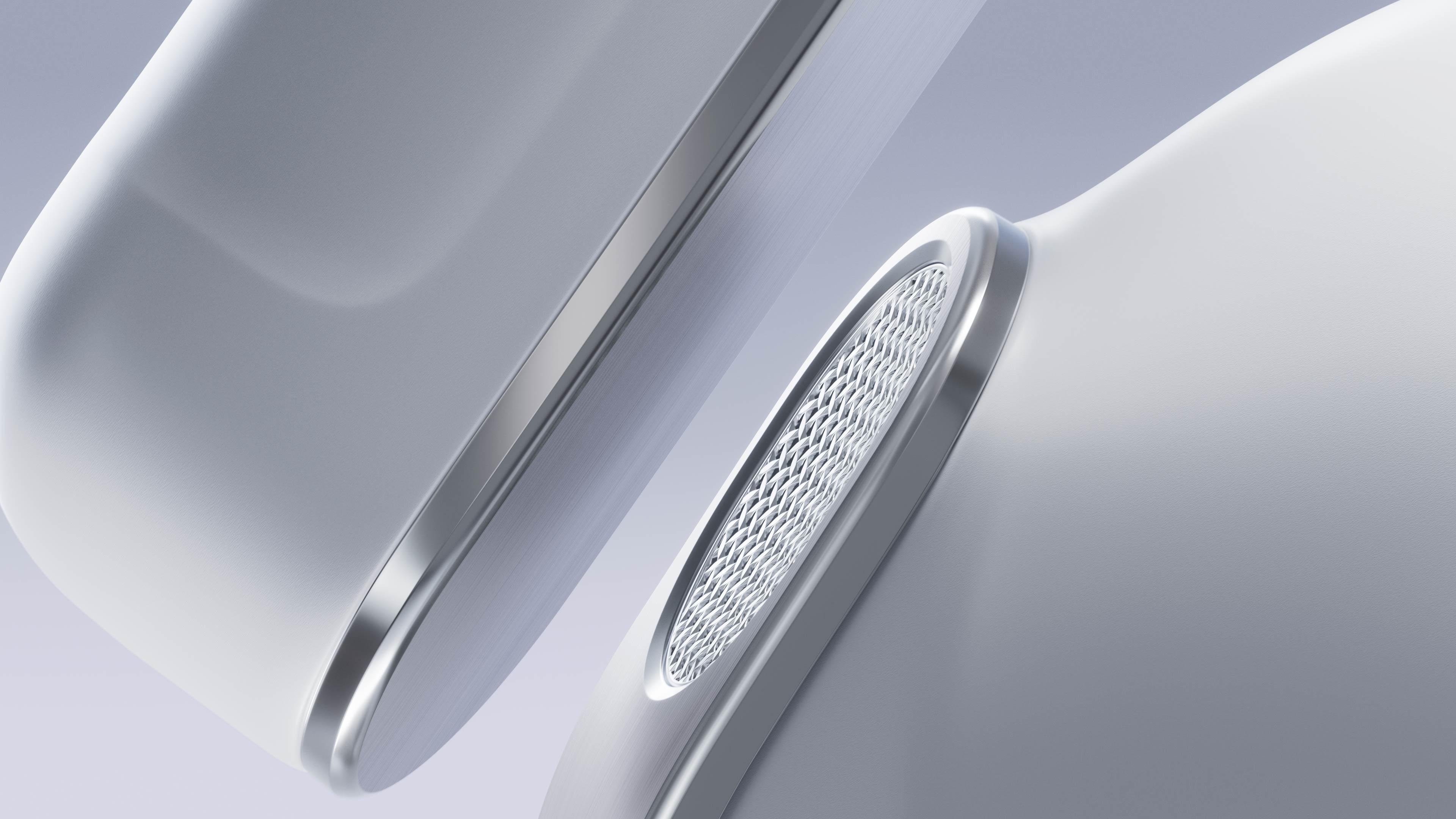 زوج من سماعات Galaxy Buds4 Pro باللون الأبيض في لقطة مقربة، مع إبراز Blade المعدنية الحقيقية لكل من سماعتي الأذن اليمنى واليسرى. في إحدى سماعتي الأذن، يتم التركيز على الجزء الشبكي الموجود أعلى Blade والذي يدور ببطء. تبرز سماعة الأذن الأخرى مادة Blade المعدنية الحقيقية. تُعرض السماعتان جنباً إلى جنب. يُحدِث تأثيرٌ اهتزازي خفيف حركة بسيطة في السماعتين، ليعكس قوة الصوت التي تقدّمها Galaxy Buds4 Pro. تظهر رؤوس الأذن المصنوعة من السيليكون في لقطة مقربة على كل جانب، في مواجهة بعضها البعض. تستمر رؤوس الأذن في الحركة مع دورانها قليلاً. عندما تختفي رؤوس الأذن، يتم وضع سماعات الأذن داخل علبة الشحن. بمجرد وضع السماعتين في مكانهما، يضيء مؤشر البطارية تلقائياً ليُعلمك بحالة الشحن. يُغلق الغطاء ويظهر الجزء العلوي من علبة الشحن، مع إبراز الغطاء الشفاف.