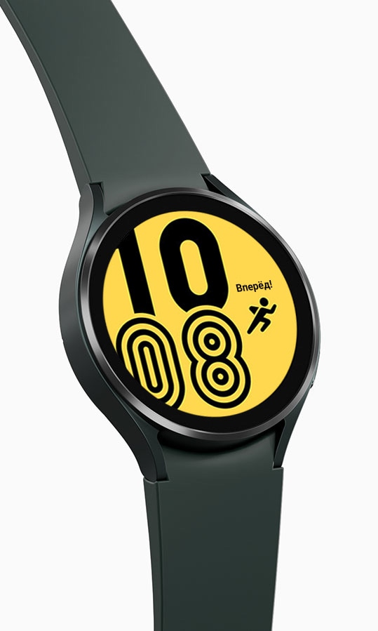 A green Galaxy Watch4 device is showing the time on its watch face in a green and white outlined design along with a green running icon.