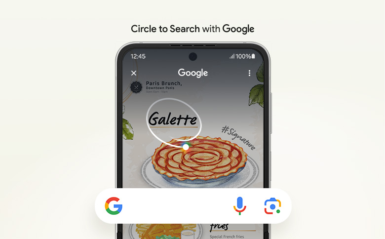 Menüde daire içine alınmış “Galette” kelimesinin bulunduğu Galaxy Z Flip6 ana ekranının yakından görünümü. Altında bir Google arama çubuğu görülüyor. Google’da Seçerek Arat logosu.