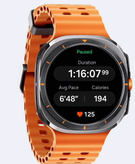 A Galaxy Watch Ultra displaying workout tracking screen with duration, average pace, burned calories and heart beat shown.