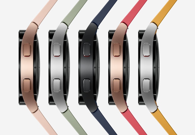 Five Galaxy Watch4 Classic devices are placed side-by-side to show different colored watch bodies and bands. The watch bodies vary in color from pink gold, silver, and black, and are mixed with different colored bands.