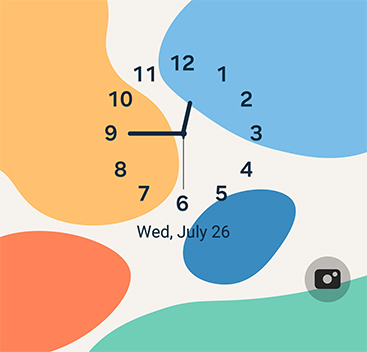 The simple clock style shows a multi-colored modern art design and an analog clock. The shortcut icon goes to the camera.
