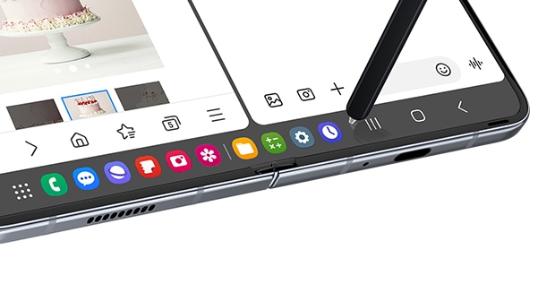 The task bar is featured at the bottom of the Main Screen. An S Pen hovers over one of the many …