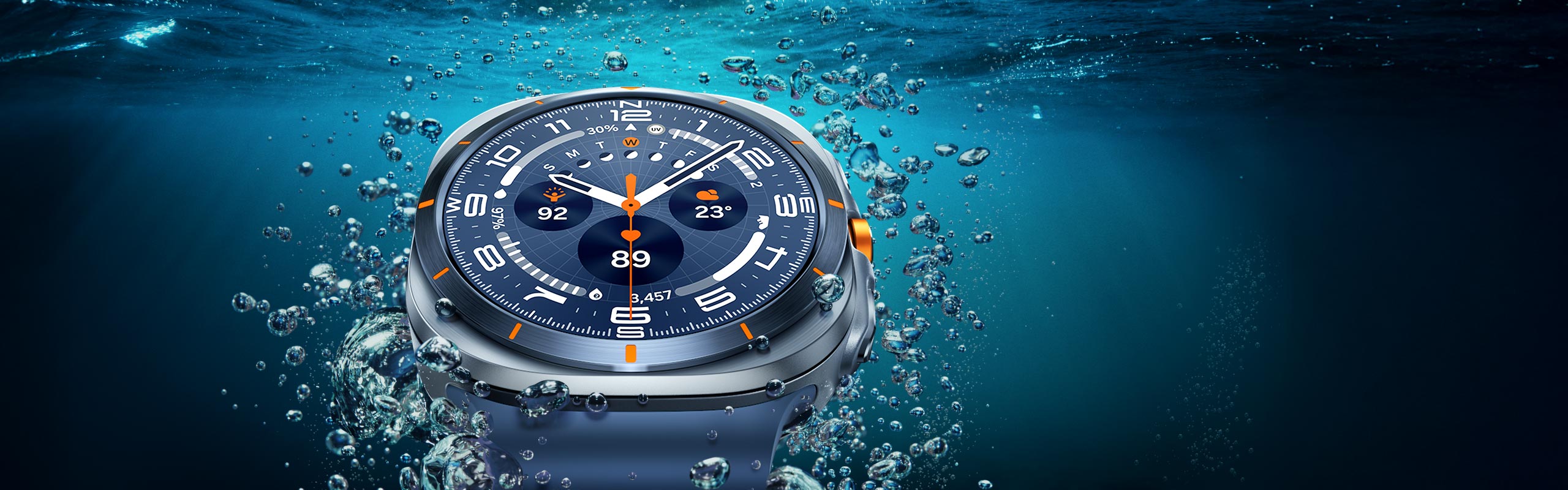A Galaxy Watch Ultra is seen close-up in the water near the surface, showcasing its design.