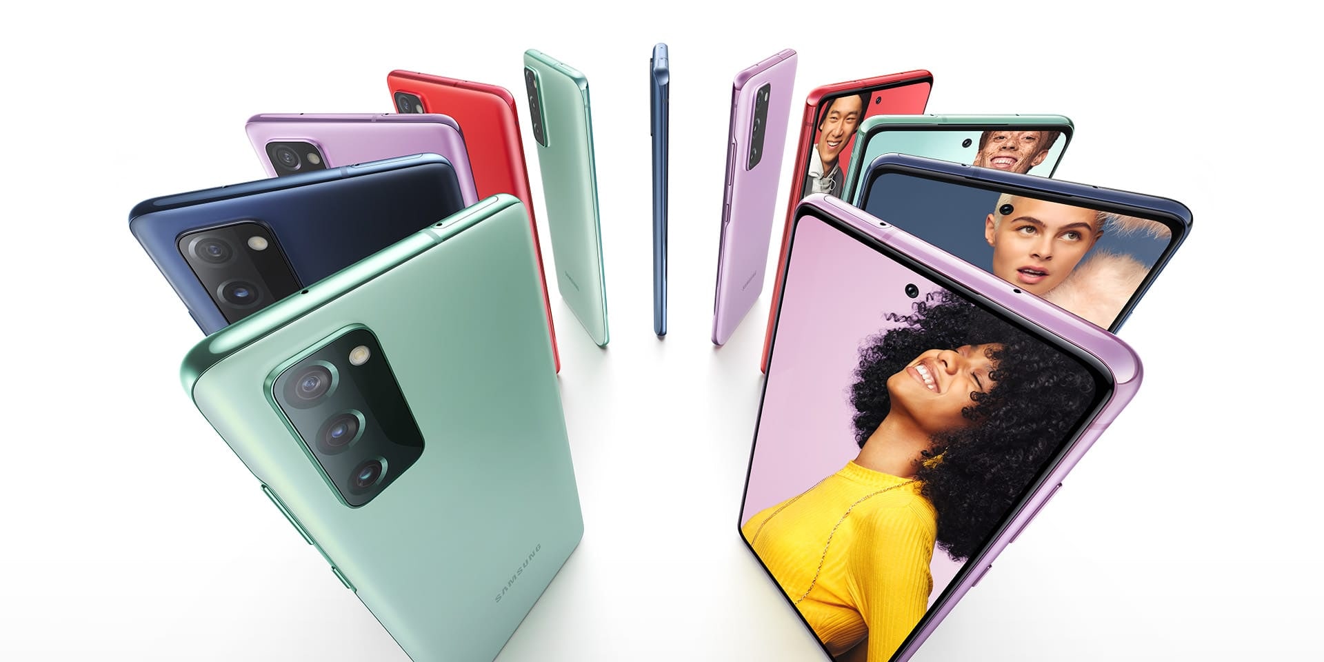 Eleven Galaxy S20 FE phones standing upright in a circle, alternating Cloud Navy, Cloud Red, Cloud Lavender, and Cloud Mint. Some are seen from the rear and some are seen from the front, with photos of people onscreen. Each person stands against a color background that matches the color of the phone.