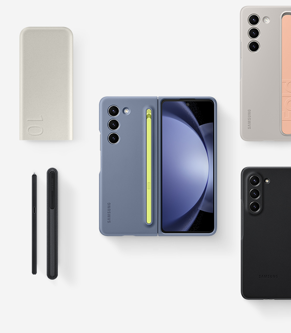 A flat lay of accessories for Galaxy Z Fold5: Battery Pack, S Pen Fold Edition for Galaxy Z Fold5 and three devices with cases installed, including a Slim S Pen Case in Blue, Standing Case with Strap in Sand and an Eco-Leather Case in Black.